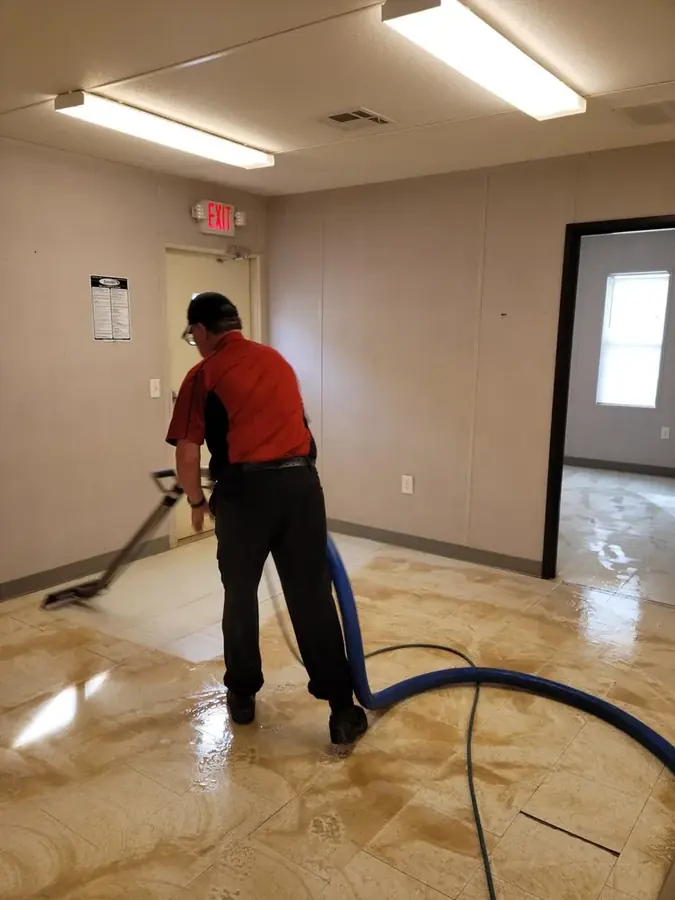 Ridgeline Restoration technician extracting water from a flooded Chino Hills, CA home